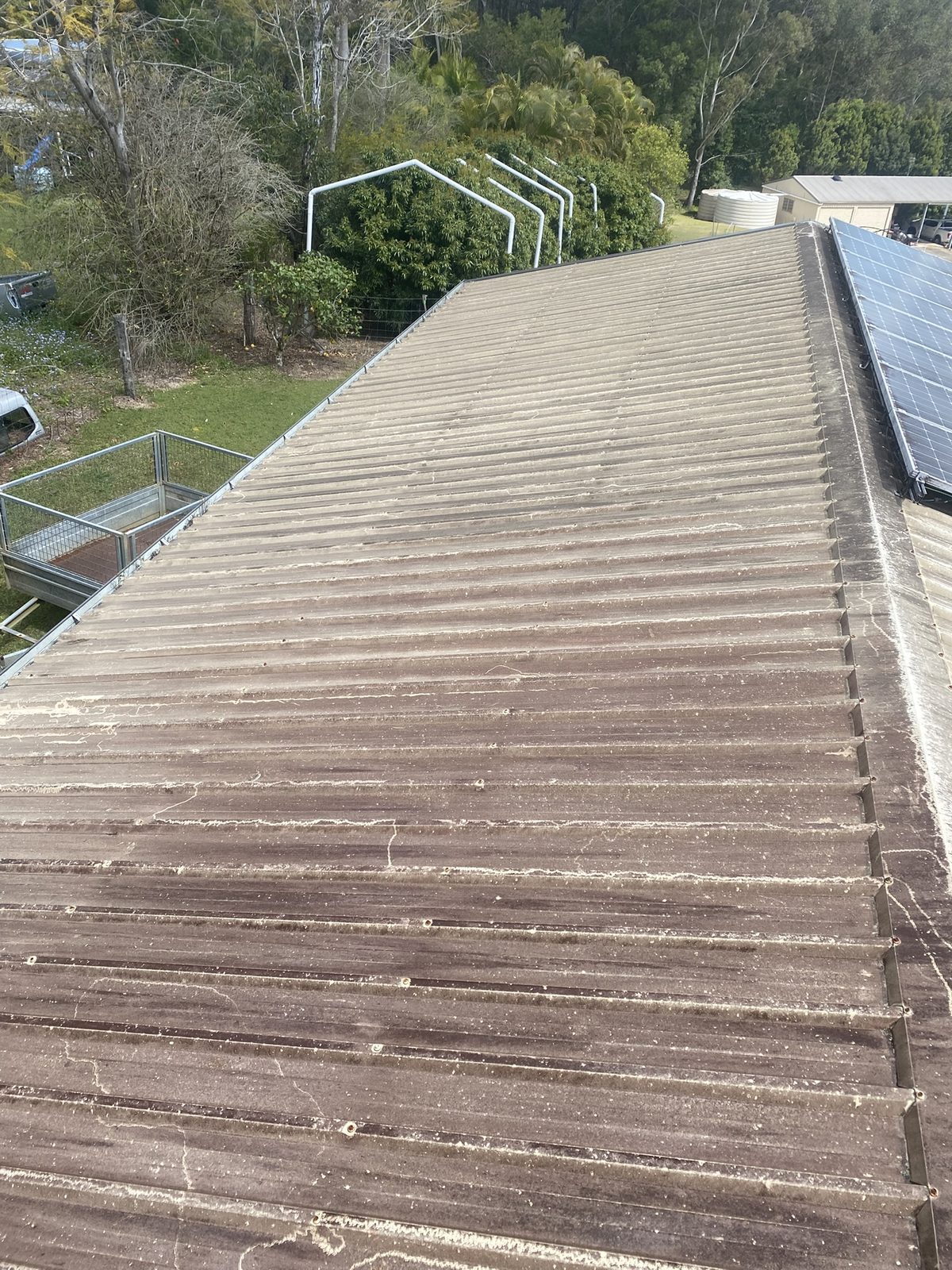 Metal roof and solar panels, before